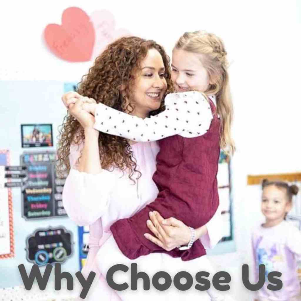 Ms. Maryam hugging and holding hands with a preschooler girl, smiling as they play together